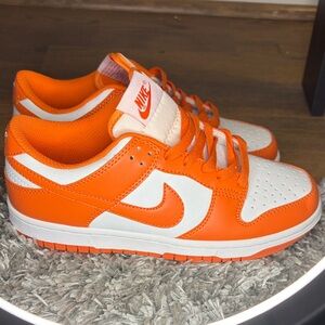 Nike Woman’s Bright Orange and White Sneakers